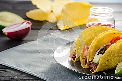 Homemade hard-shell tacos. Cripsy corn tortillas Stock Photo