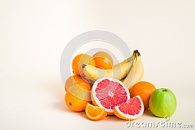 Homemade healthy beverage - multi fruits juice of red, yellow, green, orange fruits on soft light Stock Photo