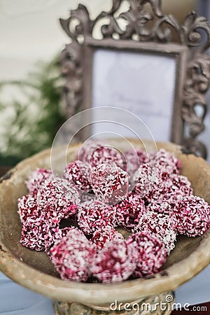 Homemade healthy vegan chocolate truffles with pistachio in the bowl. Organic energy vegetarian sweet balls Stock Photo