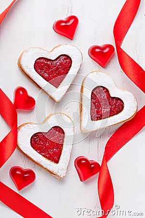 Homemade heart shaped cookies gift with jam and red ribbons for Stock Photo