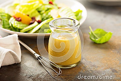 Homemade honey mustard salad dressing Stock Photo