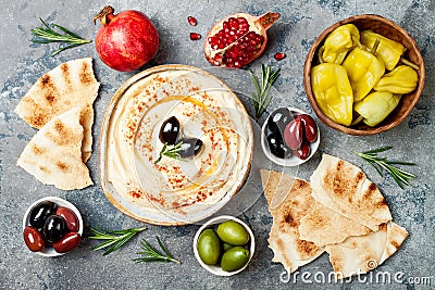 Middle Eastern traditional dinner. Authentic arab cuisine. Meze party food. Top view, flat lay, overhead. Stock Photo