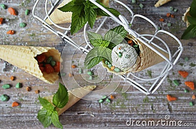 Homemade ice cream with green tea matcha in a waffle cone Stock Photo