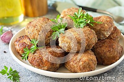 Homemade juicy delicious meat cutlets in plate close-up, meatballs from minced meat Stock Photo
