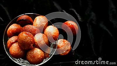 Homemade Kerala snack unniyappam in dark background Stock Photo