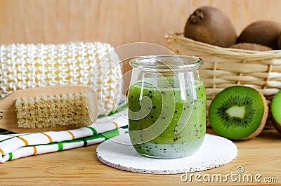 Homemade kiwi beauty mask scrub in a glass jar. DIY cosmetics. Stock Photo