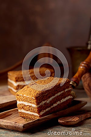 Homemade layered honey cake with cream Stock Photo