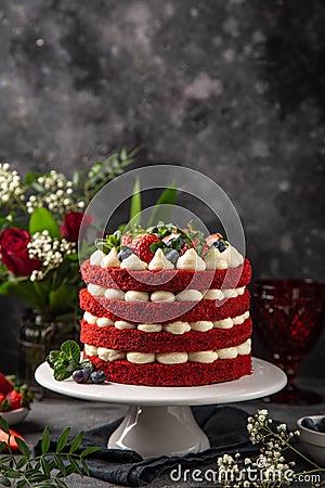 Homemade layered Red Velvet cake, dark background Stock Photo