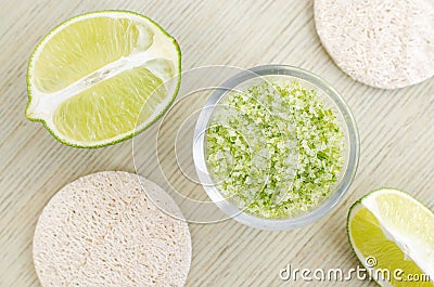 Homemade lime scrub with lime zest and juice, sea salt and olive oil. DIY beauty treatments and spa recipe. Stock Photo