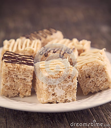 Homemade Marshmallow Rice Crispy Dessert Bar with chocolate Stock Photo