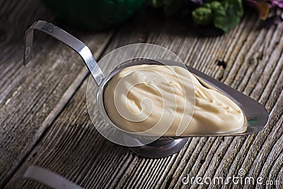 Homemade mayonnaise in a gravy boat Stock Photo