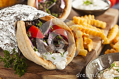 Homemade Meat Gyro with French Fries Stock Photo