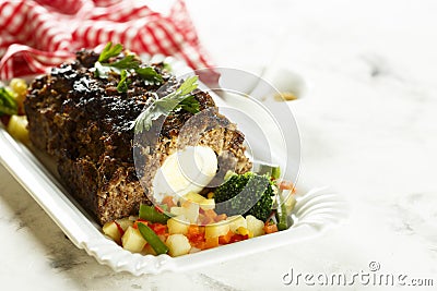 Homemade meat loaf with hard boiled eggs Stock Photo