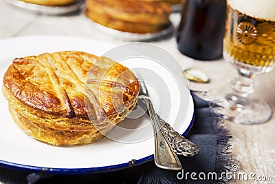 Homemade meat pie and beer on a rustic table Stock Photo