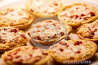 Homemade mini pizza snacks on a plate Stock Photo