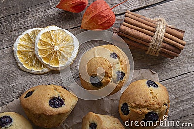 Homemade muffins on the rustic table - delicious pastries. Delicious dessert Stock Photo