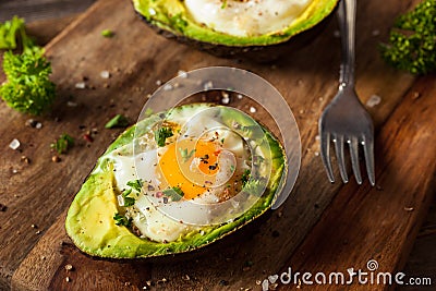 Homemade Organic Egg Baked in Avocado Stock Photo