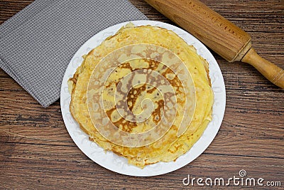 Pancake plate on a wooden table Stock Photo