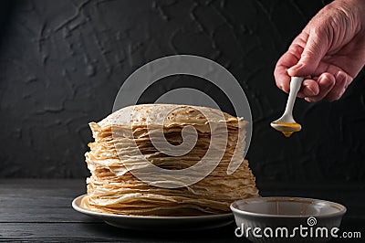 Homemade pancakes with honey and walnuts, vintage white plate, d Stock Photo