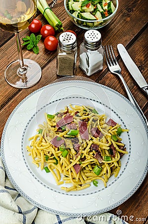 Homemade pasta with roasted Black Forest ham Stock Photo