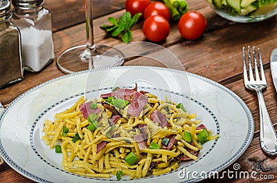 Homemade pasta with roasted Black Forest ham Stock Photo