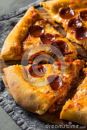 Homemade Pepperoni Stuffed Crust Pizza Stock Photo