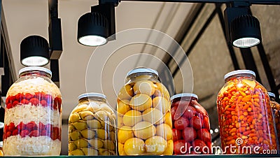 Homemade pickled fermented preserved vegetables in jars Stock Photo