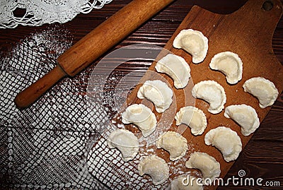 Homemade pierogi dumpling, traditional East European food before Stock Photo