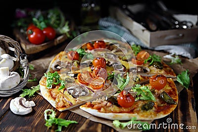 Homemade pizza with champignons,tomatoes and pepper Stock Photo