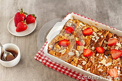 Homemade pudding made by leftovers bread and strawberries Stock Photo