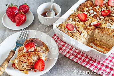 Homemade pudding made by leftovers bread and strawberries Stock Photo