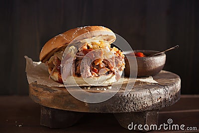 Homemade pulled pork burger with caramelized onion and bbq sauce Stock Photo