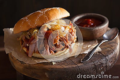 Homemade pulled pork burger with caramelized onion and bbq sauce Stock Photo