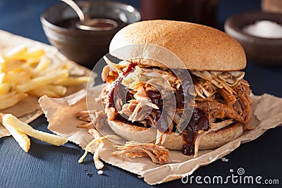 Homemade pulled pork burger with coleslaw and bbq sauce Stock Photo