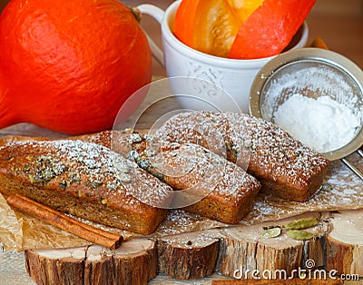 Homemade pumpkin financier cake with cinnamon and cardamom. Autumn spiced cakes Stock Photo