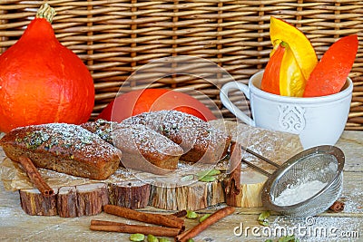 Homemade pumpkin financier cake with cinnamon and cardamom. Autumn spiced cakes Stock Photo