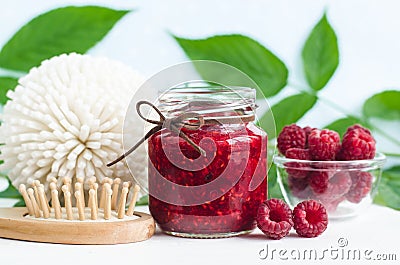 Homemade raspberry face and hair mask/scrub in a glass jar. DIY cosmetics and spa. Stock Photo