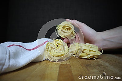 Homemade raw egg noodles on a background Stock Photo