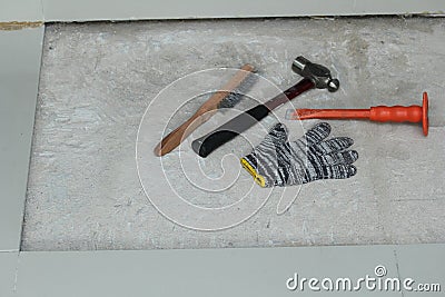 Homemade Replacing floor tiles in home Stock Photo