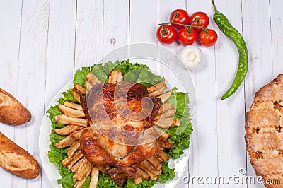 Homemade roasted whole turkey on wooden table for Thanksgiving. Stock Photo