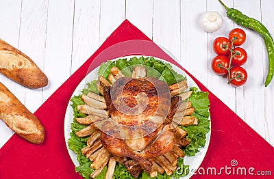 Homemade roasted whole turkey on wooden table for Thanksgiving. Stock Photo