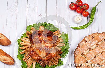 Homemade roasted whole turkey on wooden table for Thanksgiving. Stock Photo