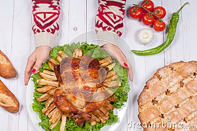 Homemade roasted whole turkey on wooden table for Thanksgiving. Stock Photo