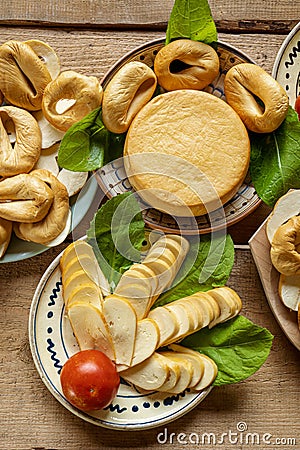 Homemade Romanian cheese plates with smoked sheep milk hardcheese and pressed cheese Stock Photo