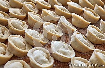 Homemade russian dumplings on the wooden board Stock Photo