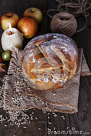 Homemade rustic bread over wooden background Stock Photo