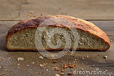 Homemade white bread with brown salty wet crust, cut in half Stock Photo