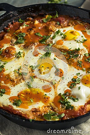 Homemade Saucy Shakshuka with Eggs Stock Photo