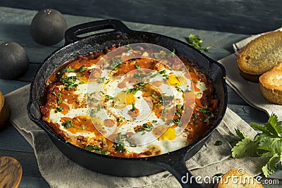 Homemade Saucy Shakshuka with Eggs Stock Photo