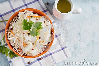 Homemade Sauerkraut with seasonings in an orange bowl. Natural Probiotics, Healthy Food Stock Photo